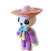 patron-amigurumi-catrin-mariachi-pdf-21 Primer plano de la cabeza de Don Cuco destacando sus grandes ojos negros kawaii